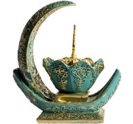 Decorative turquoise crescent with ornate detailing.
