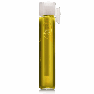 A vial filled with yellow liquid, sealed with a white cap.